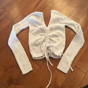 White adjustable sweater